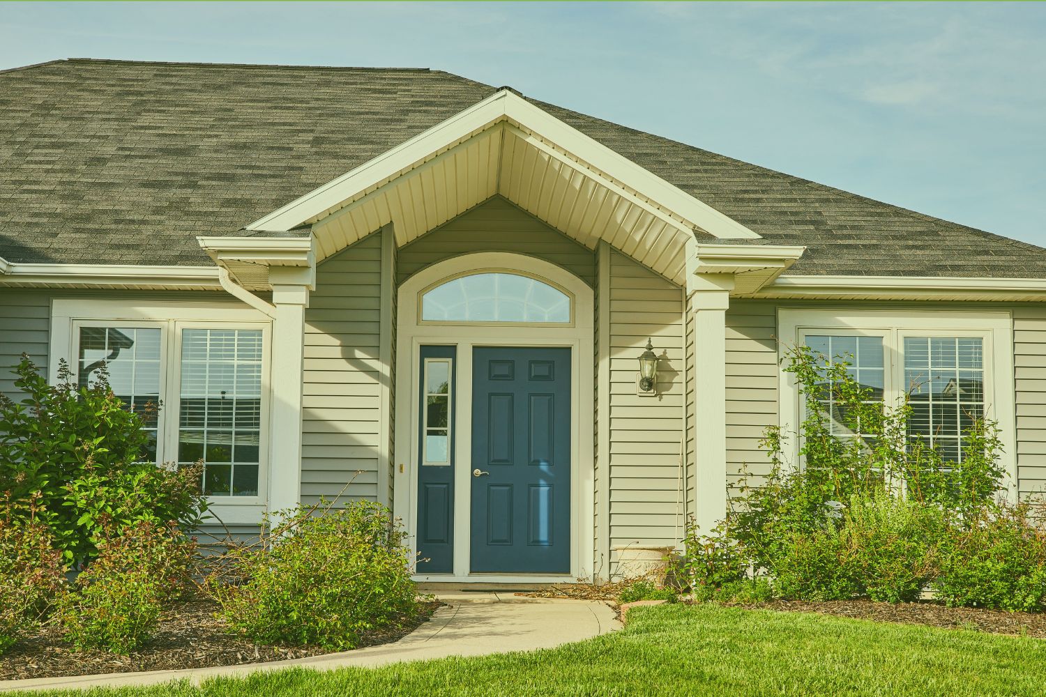 Suburban Indiana house with roof and siding visible, illustrating how long do home inspections take on site